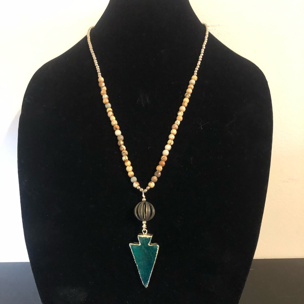 Aventurine arrow pendant with jasper beads and brass accent bead.